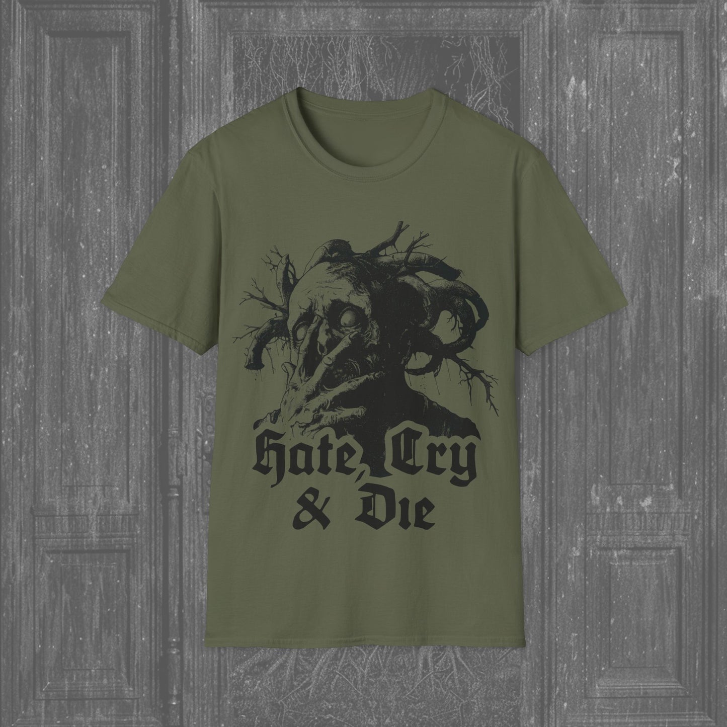 Creature of Shame Creepy T-shirt featuring a twisted figure shielding its face, symbolizing anguish and secrecy, printed on a military green style tee