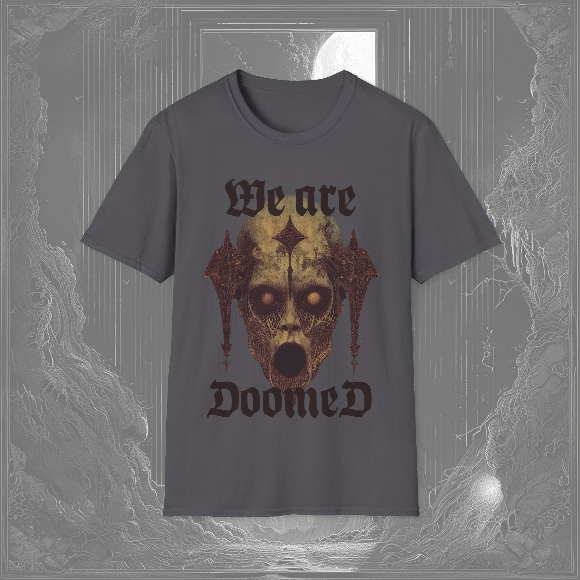 Charcoal gothic t-shirt featuring a haunting statuesque head with hollow eyes, an open mouth, and the text "We Are Doomed" in eerie, bold lettering